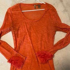Beautiful sheer orange long sleeve detailed cuff.